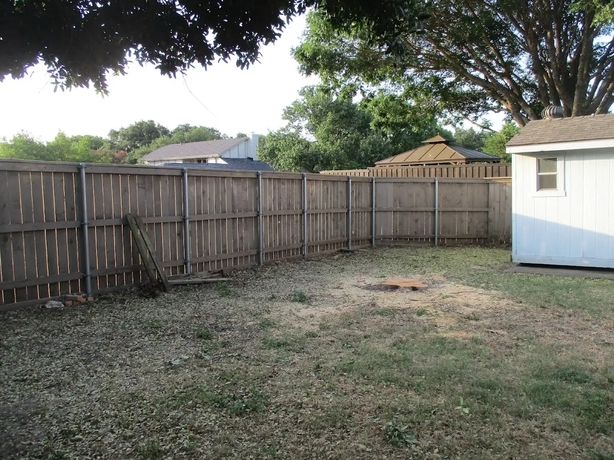 Cleared yard after professional tree removal in Wendell Depot